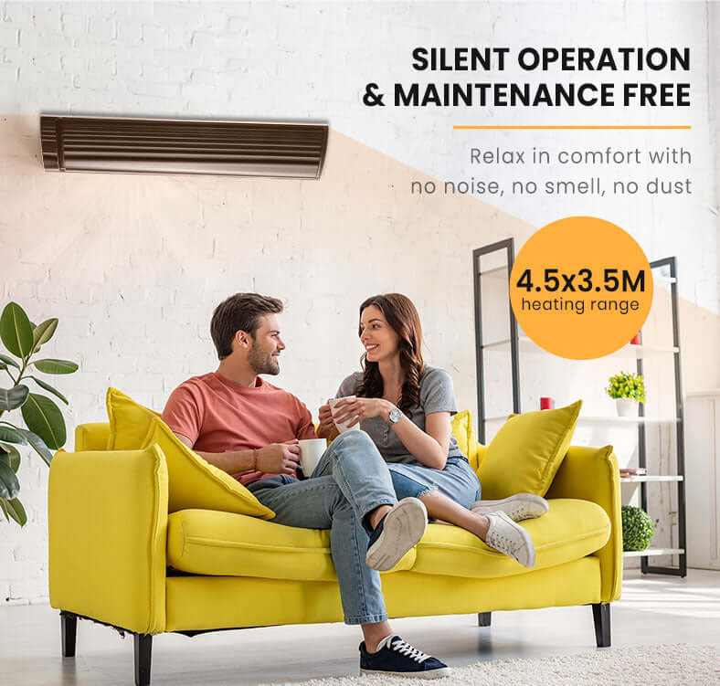 Couple relaxing on yellow sofa under sleek outdoor heater, highlighting silent operation and maintenance-free comfort.