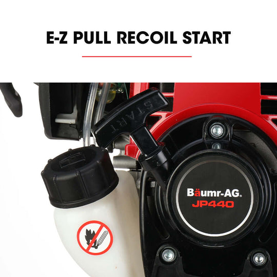 Close-up of Baumr-AG JP440 petrol jackhammer's E-Z pull recoil start mechanism for easy operation.