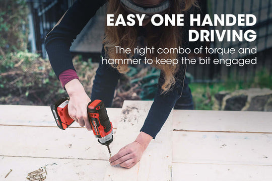 User demonstrating easy one-handed driving with a BAUMR-AG cordless impact driver on wood.