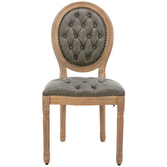 Affordable pine green velvet dining chair with solid wood legs and tufted faux leather upholstery.