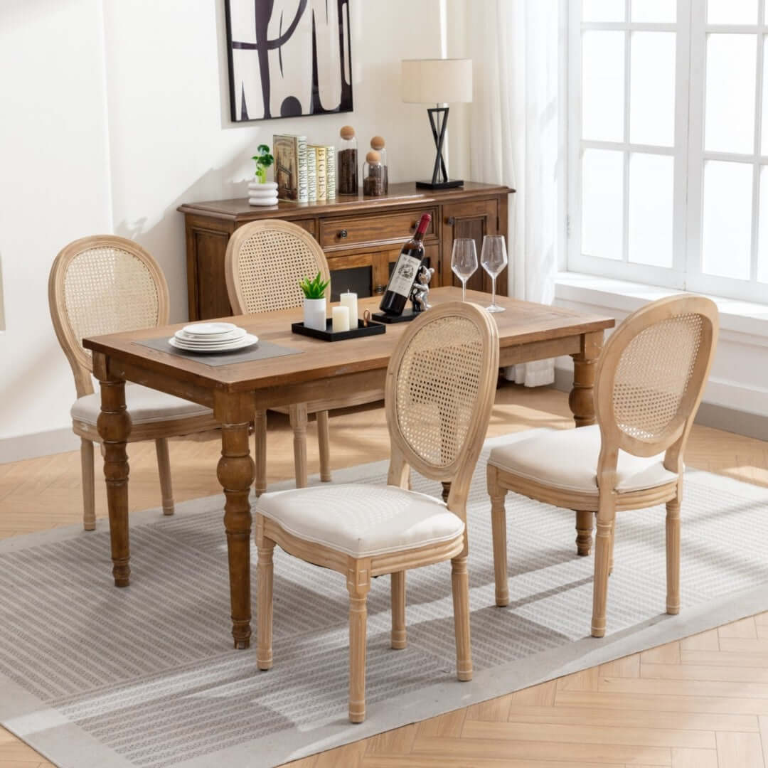 Elegant dining setting featuring AADEN rattan chairs with solid wood legs, showcasing chic French design and comfort.