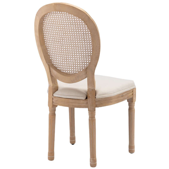 Beige rattan dining chair with solid wood legs featuring a stylish, intricately carved back, ideal for affordable luxury.