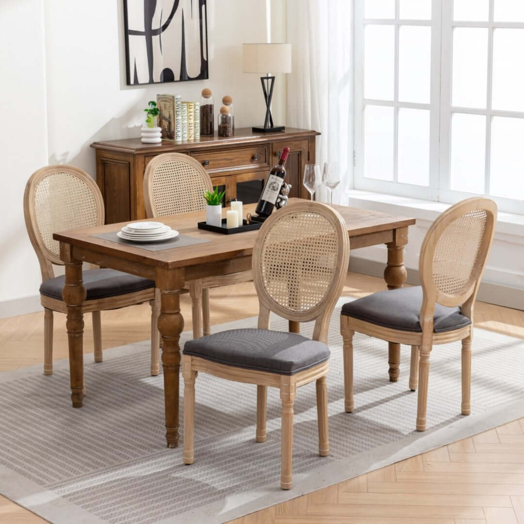 Elegant AADEN rattan dining chairs with solid wood legs in a chic dining setup featuring a wooden table and modern decor.