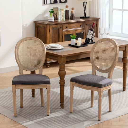 Affordable AADEN grey rattan dining chairs with solid wood legs in chic French design, enhancing dining space elegance and comfort.