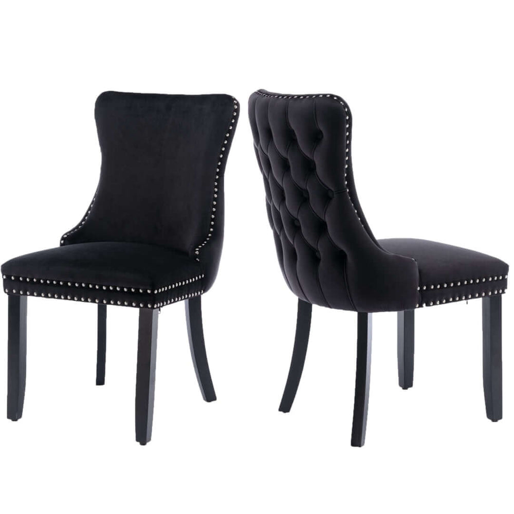 Velvet upholstered dining chairs with studs trim and solid wood legs in black, set of two, tufted back design, elegant modern style.