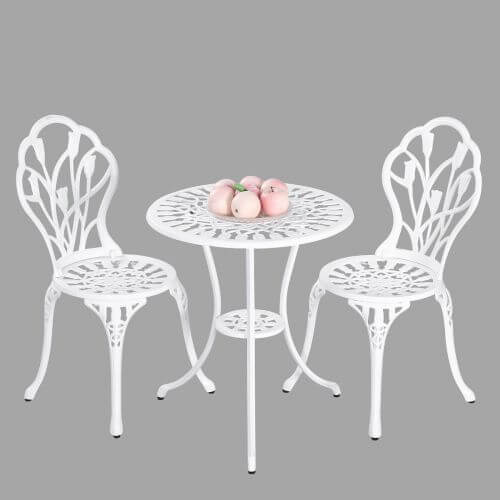 2 Seater Dominique Cast Aluminium Bistro Set in white for garden or balcony, featuring two chairs and a round table with decorative cutout designs.