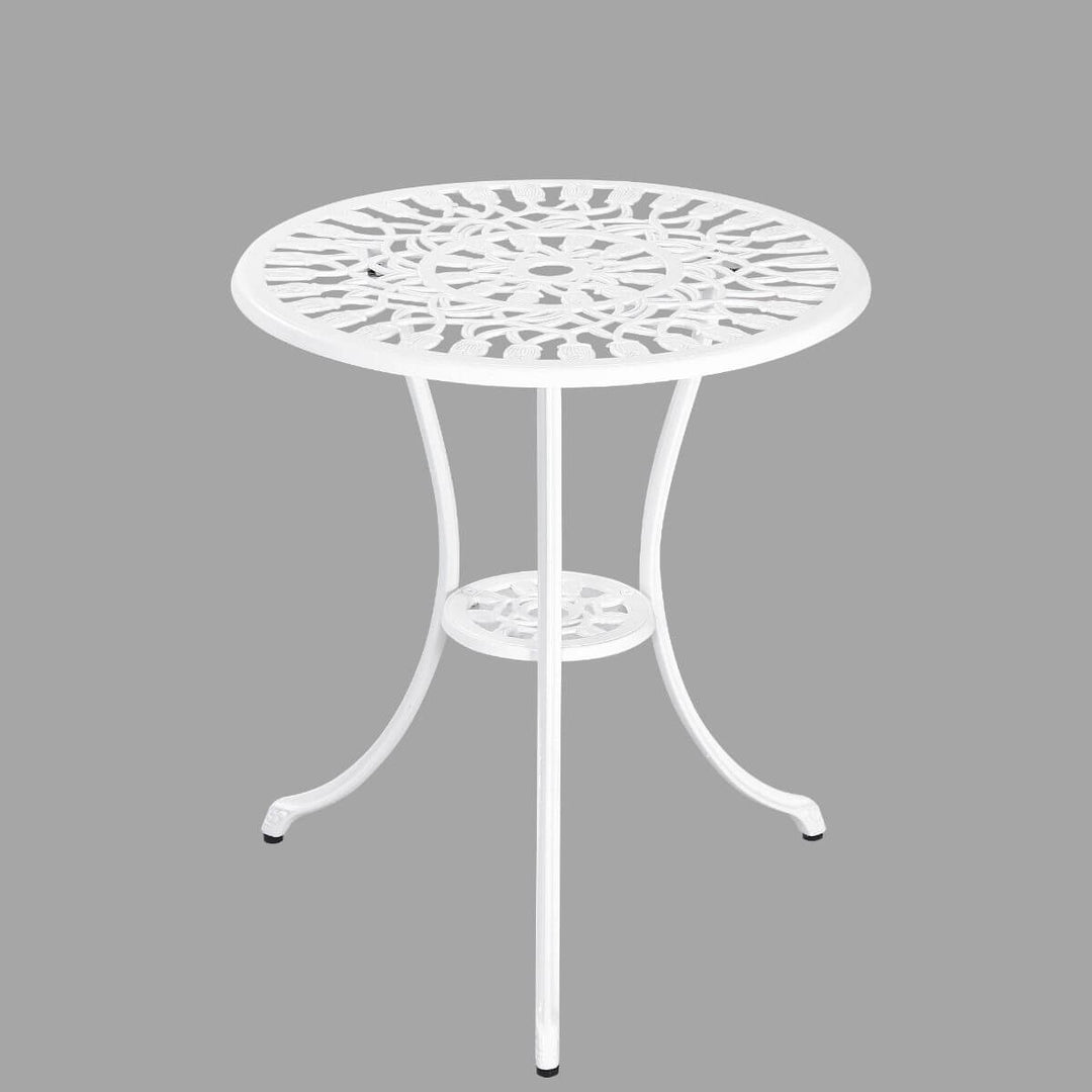 White cast aluminium bistro table for garden or balcony use with intricate design top and three curved legs.