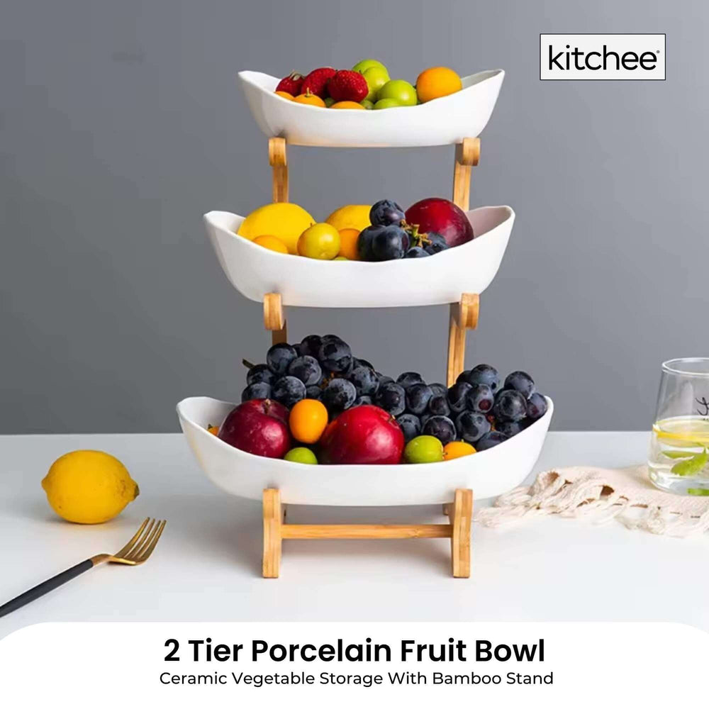 2 Tier Porcelain Fruit Bowl with Bamboo Stand, stylish ceramic storage for fruits and veggies, affordable luxury for your kitchen.