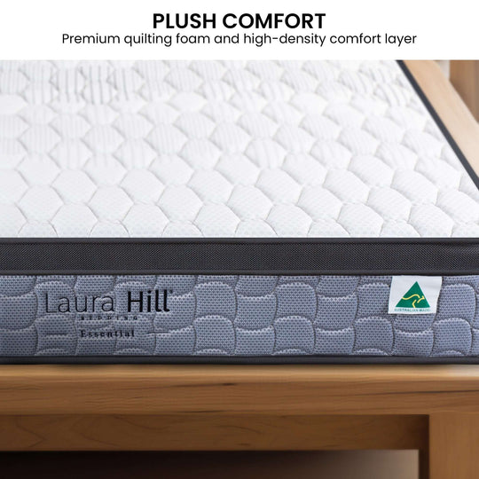 Laura Hill Essential Mattress showcasing premium quilting foam and high-density comfort layer for luxury sleep.