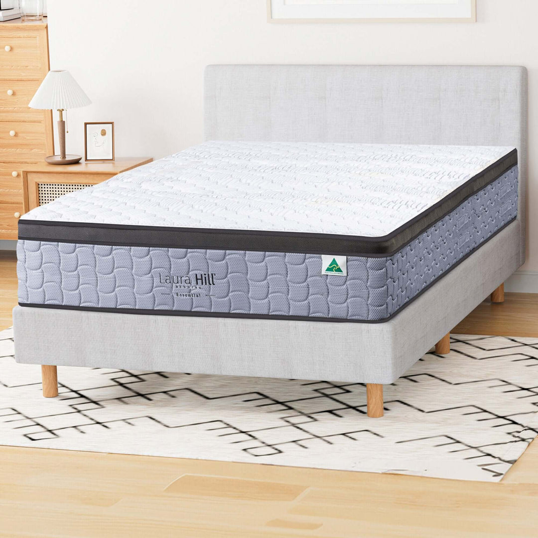 Laura Hill Essential Australian Made King Premium Mattress on a bed, featuring quality materials for affordable luxury.