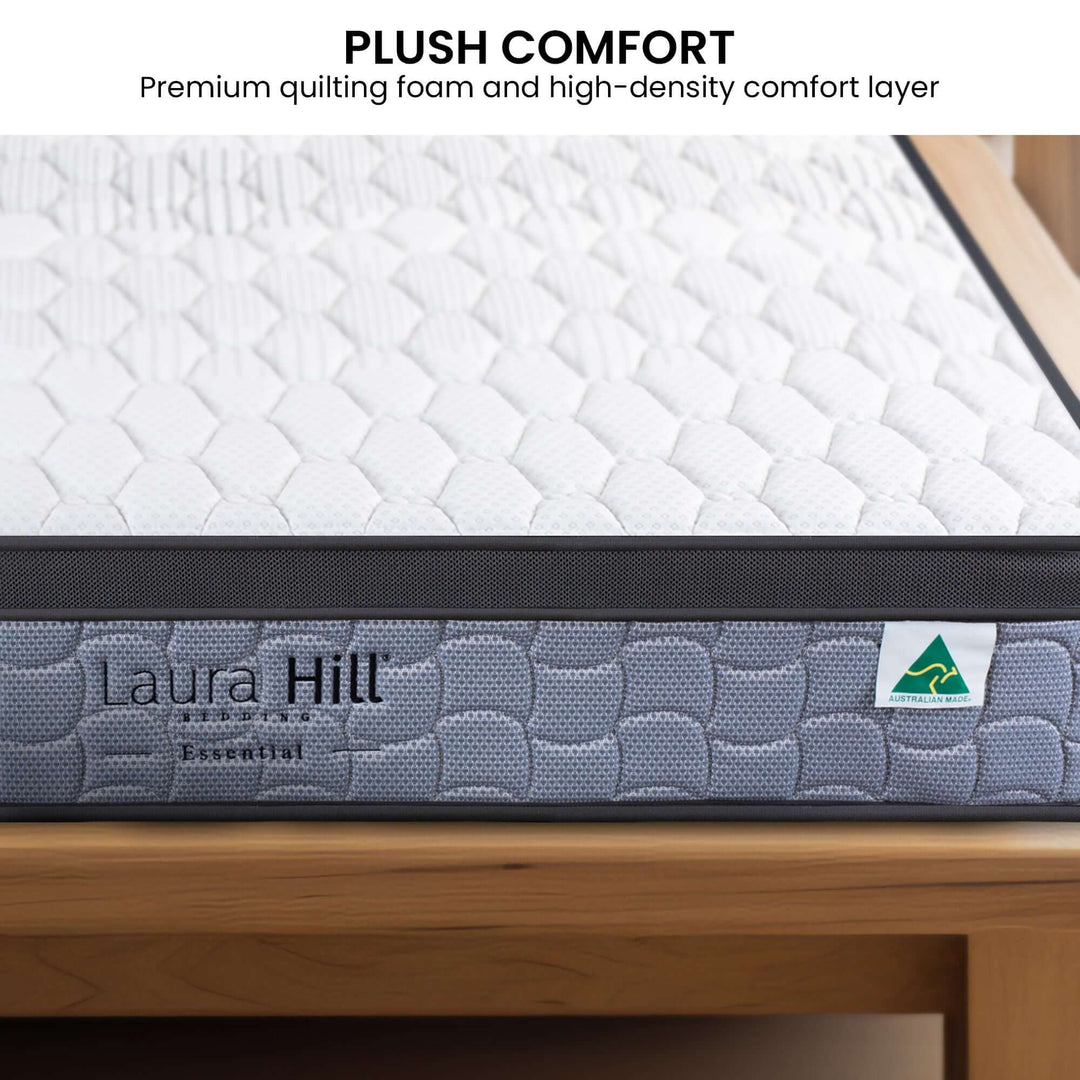 Laura Hill Essential Mattress featuring plush quilting foam and high-density comfort layer for quality sleep.