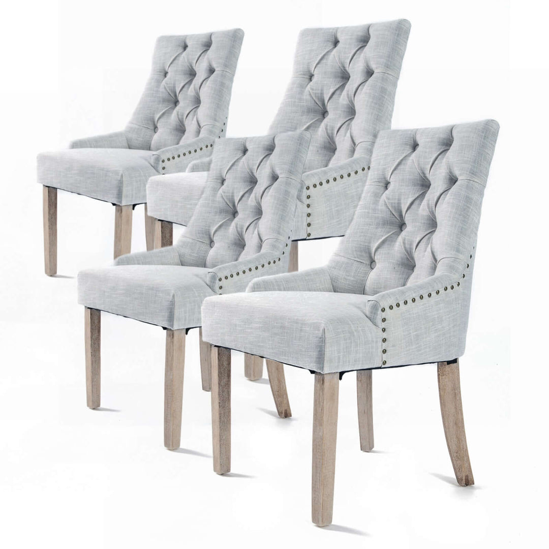 4X French Provincial Dining Chairs with Oak Legs in Grey Upholstery featuring tufted backs and studded accents