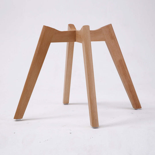 Wooden dining chair legs in a minimalist design.