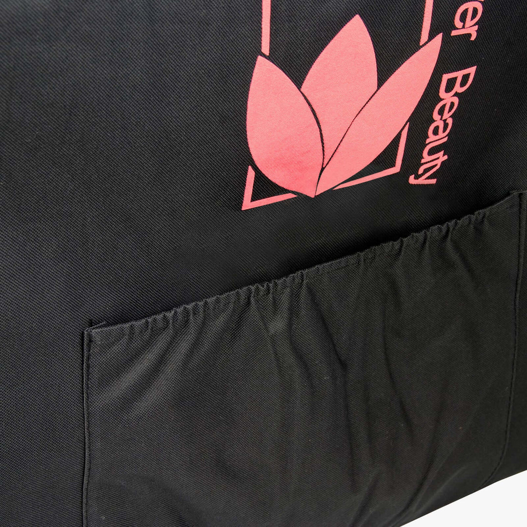 Black portable massage table carry bag with red logo and side pocket for convenient storage. Affordable and durable design.