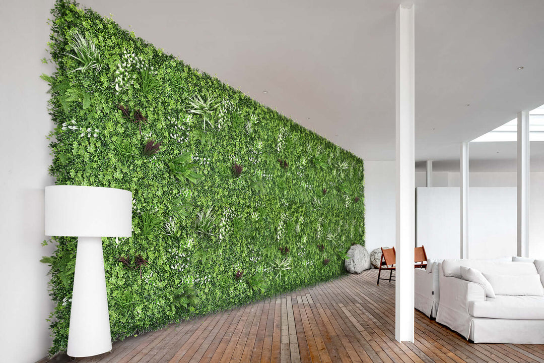 Lush green artificial plant wall panel in modern living room with lamp and furniture, showcasing affordable DIY vertical garden.