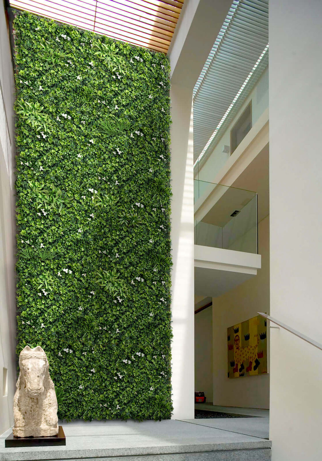 Lush green artificial plant wall panel in modern indoor space, enhancing decor with affordable and high-quality design.