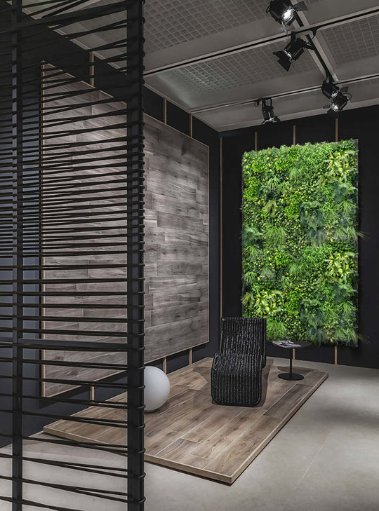 Modern interior featuring a lush artificial vertical garden panel alongside wooden wall textures. Stylish seating area with decor.