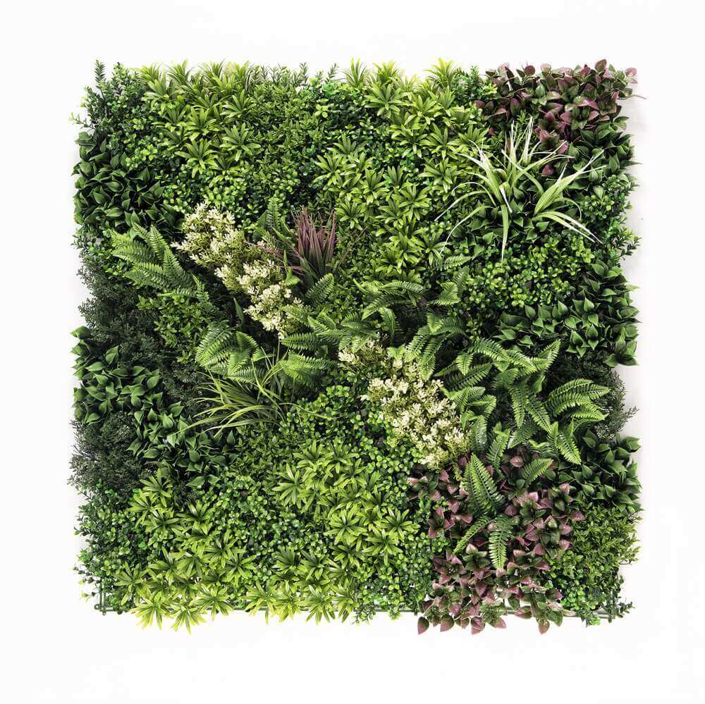 Lush green artificial plant wall panel featuring various foliage, perfect for DIY vertical gardens and affordable decor.