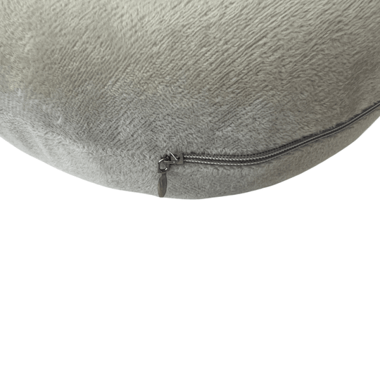 Close-up of a U-shaped travel pillow with zipper detail, ideal for neck support and comfort during travel.