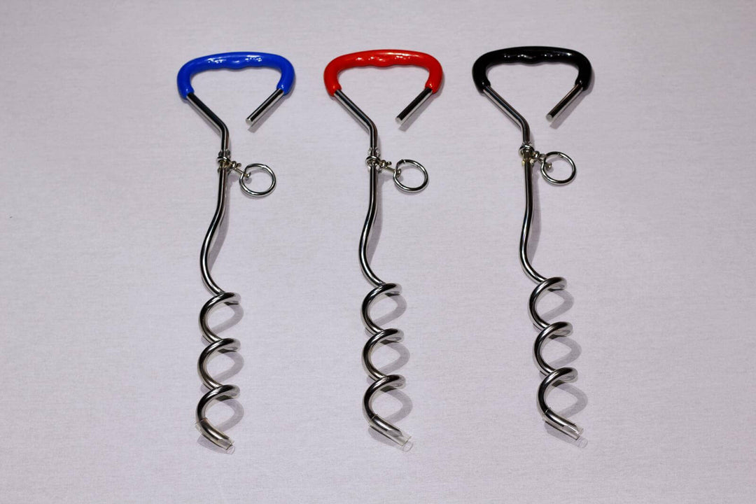 Set of 3 chrome plated corkscrew spiral tie out stakes for pets in blue, red, and black colors, promoting safety and control.