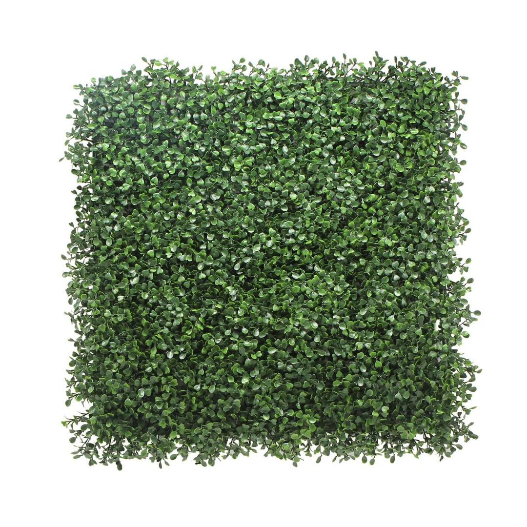 Lush green artificial plant wall grass panel, perfect for DIY vertical gardens and affordable home decor solutions.