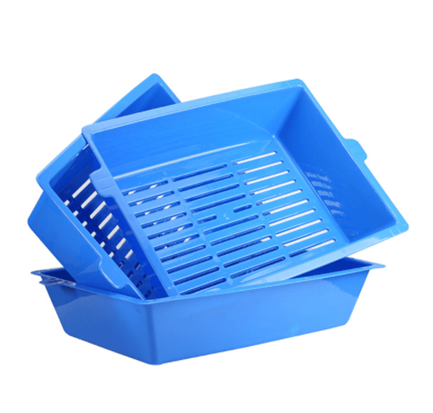 Three blue slotted kitty litter trays stacked for easy waste removal and mess reduction.