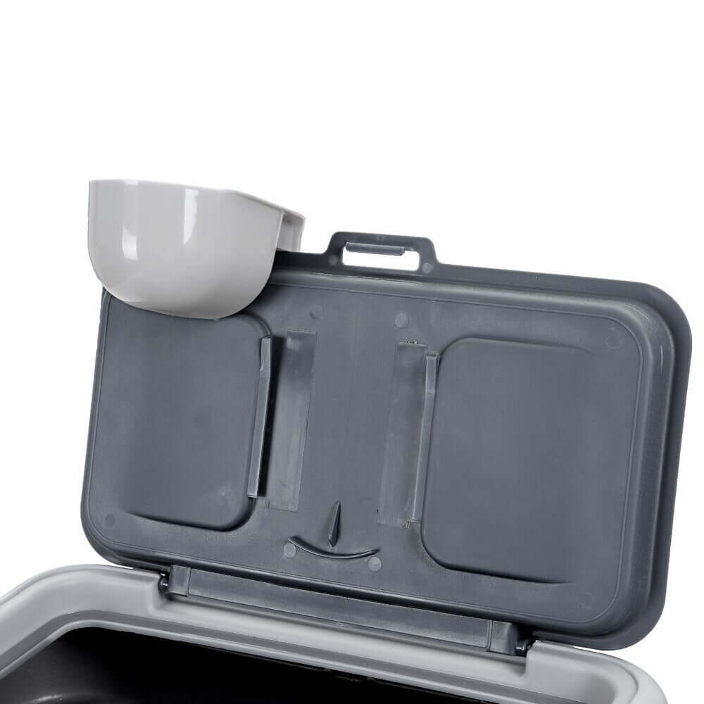 Top view of a grey 30L pet food storage container with attached scoop and clip lock lid for easy access.