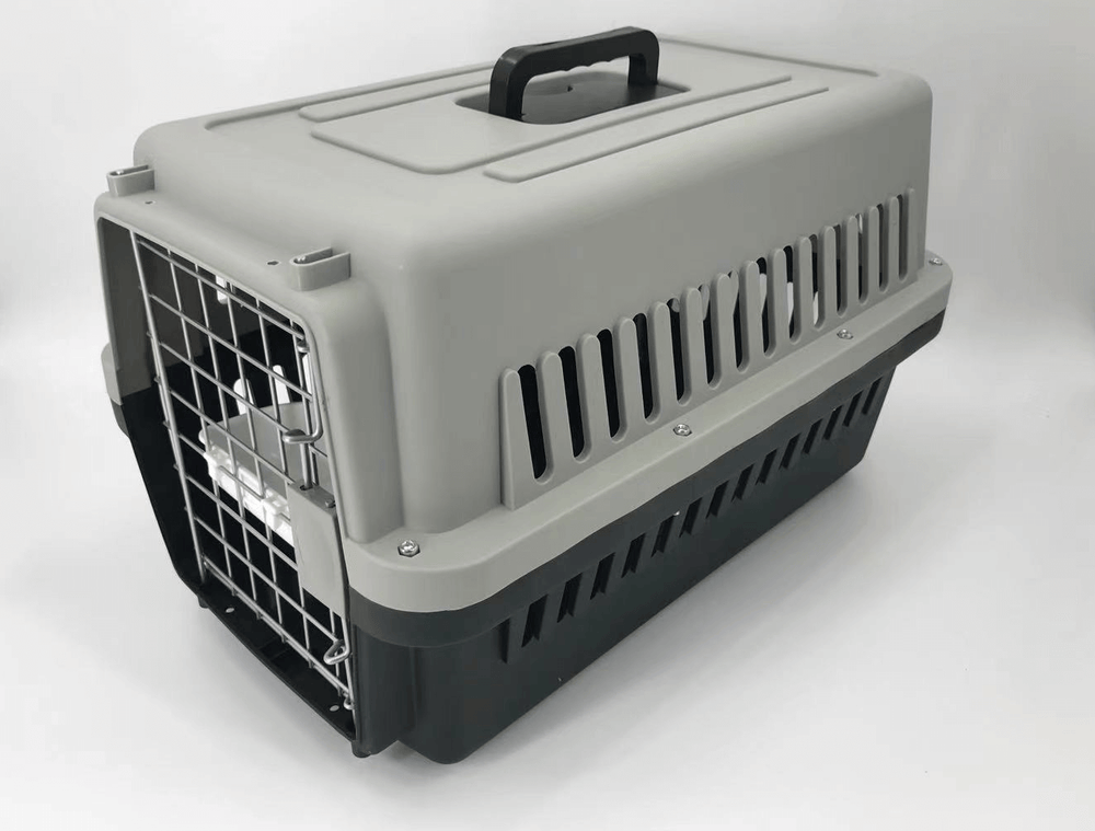 Affordable medium pet carrier for dogs and cats, lightweight with ergonomic handle and ventilation slots.