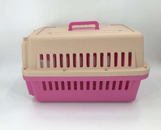 YES4PETS medium dog and cat crate pet carrier in pink, lightweight design with ventilation slots and ergonomic handle.