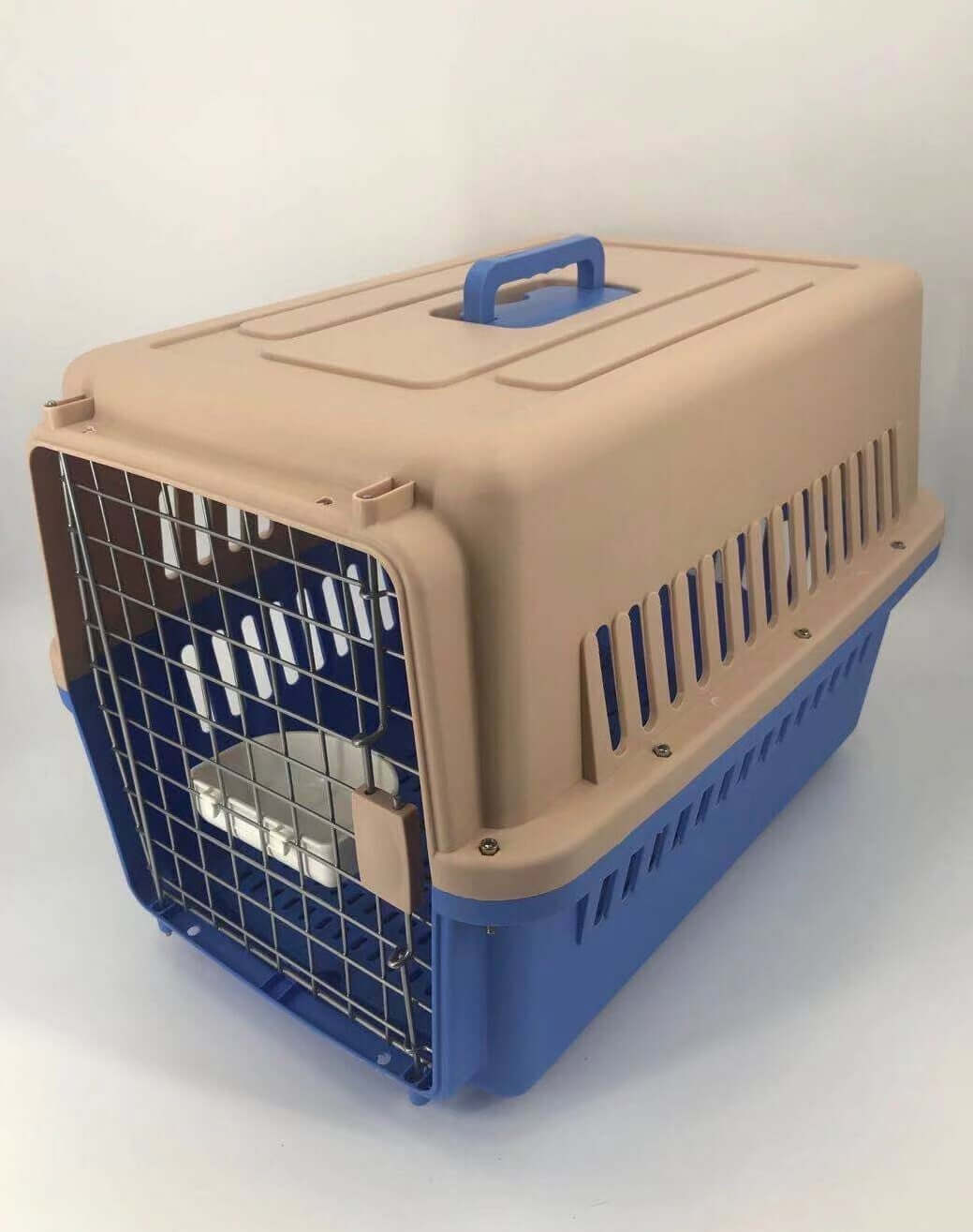 Affordable large dog and cat crate in blue and beige, featuring ventilation slots, ergonomic handle, and included tray.