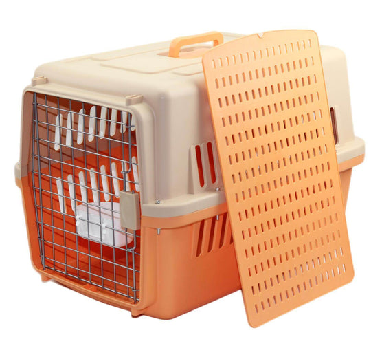 Large orange pet carrier for cats and medium dogs with tray, ventilation slits, and ergonomic handle.