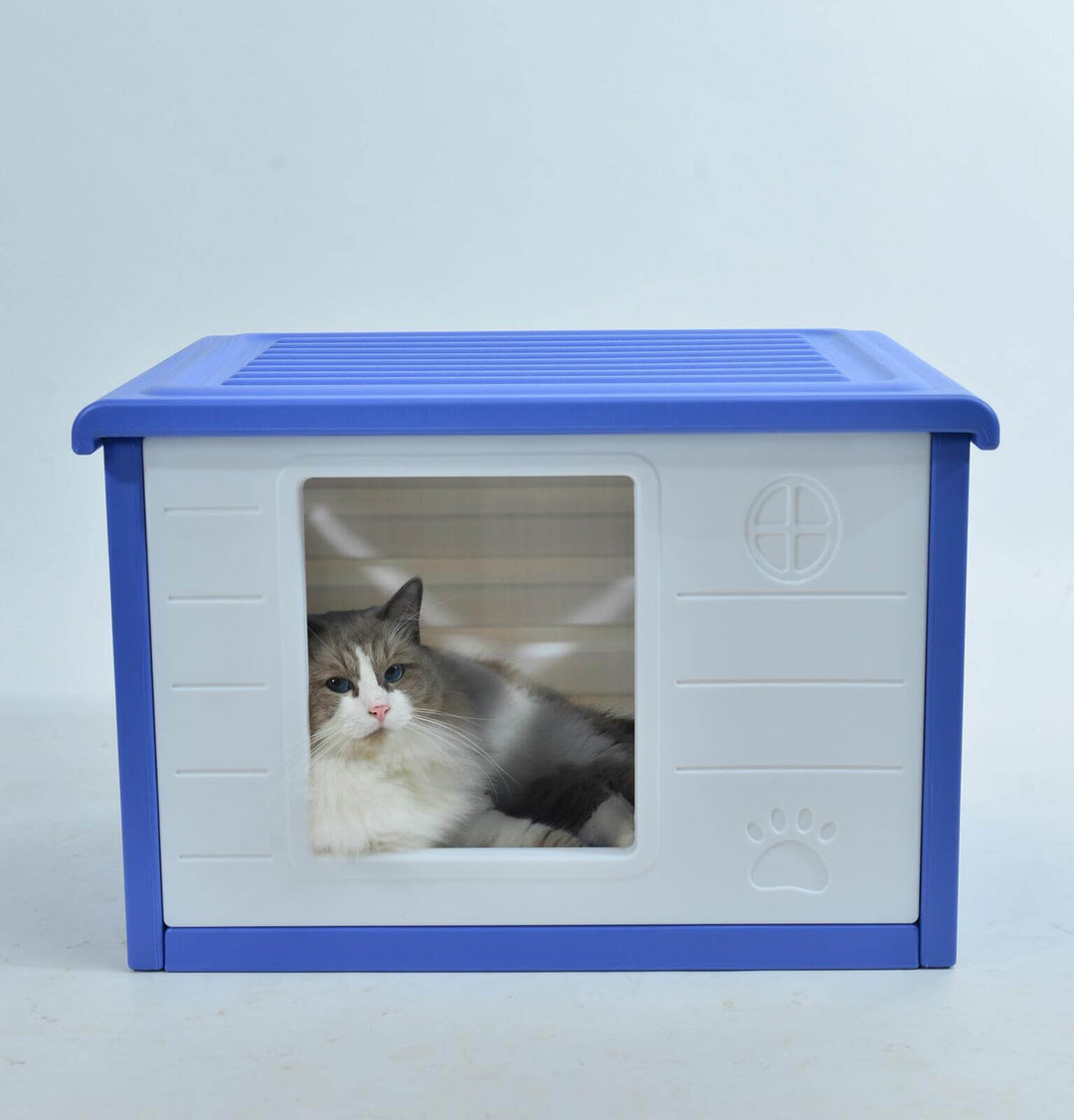 Small blue plastic cat house kennel featuring a cozy interior and ventilation for pets, suitable for dogs up to 15 kg.