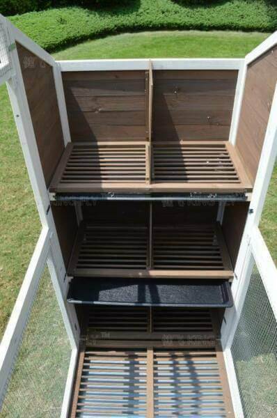 Interior view of YES4PETS XXL aviary pigeon cage showcasing wooden nesting boxes and compartments.