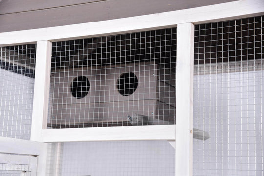 Close-up of YES4PETS bird cage with mesh wire and nesting boxes for canaries and parrots.