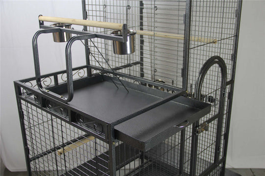 Interior view of YES4PETS XL Bird Cage with perch and feeding bowls for easy access and cleaning.