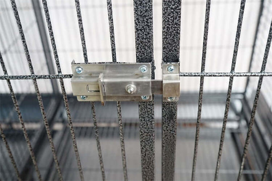 Close-up of secure lock on YES4PETS bird cage, ensuring safety and durability for pets.