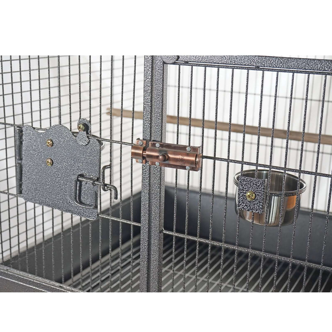 Close-up of YES4PETS bird cage lock with stainless steel feeder bowl, designed for easy access and cleaning.