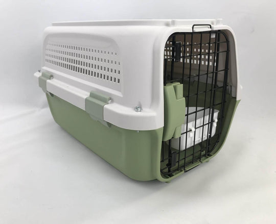 Lightweight green pet carrier for small dogs, cats, and rabbits with ventilation and spacious design.