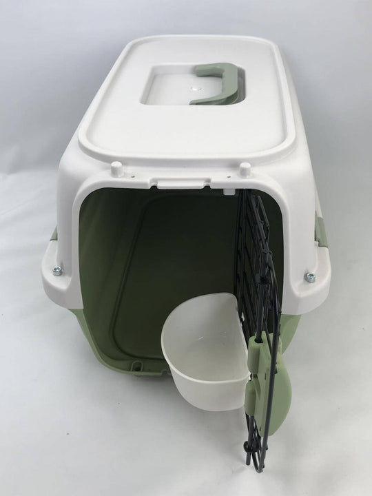 Green small pet carrier for dogs, cats, and rabbits with a large entrance. Lightweight and durable design for easy travel.