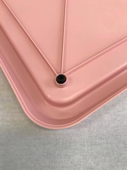 Close-up of YES4PETS large pink portable dog potty training tray showcasing edge detail and drainage hole.