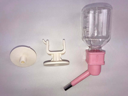 YES4PETS pink no-drip pet water bottle parts, including bottle, holder, and base for small animals.