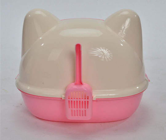 Cute pink and cream hooded cat litter box with scoop, designed for privacy and easy cleaning, ideal for DIY pet owners.