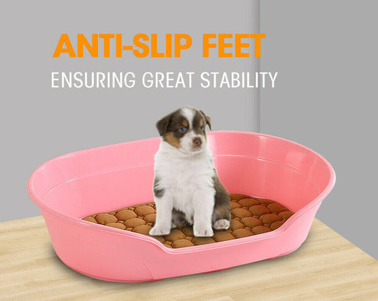 Small pink dog bed with anti-slip feet, providing stability and comfort for pets during rest.