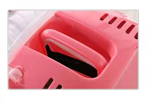 Close-up of ergonomic handle on YES4PETS portable pet carrier in pink, designed for comfort and easy travel.