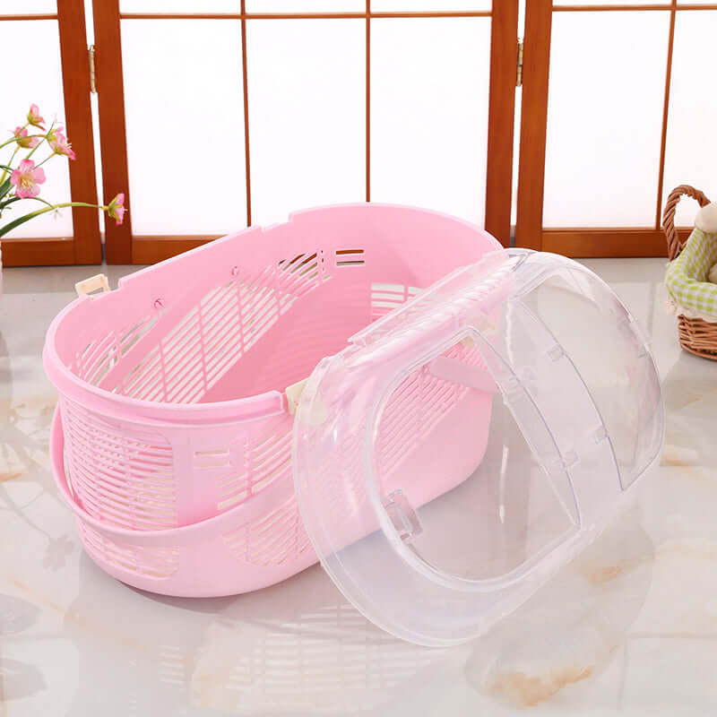 YES4PETS pink pet carrier for small dogs and cats, featuring a clear top and ample ventilation slots.