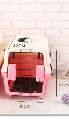 Small portable pink pet carrier with dimensions 42CM x 30CM x 31CM, ideal for travel and easy storage.