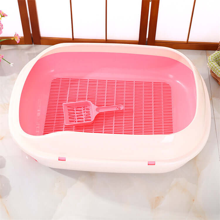 Large pink portable cat litter box tray with scoop and grid for easy cleaning and minimal mess. Affordable and high-quality design.