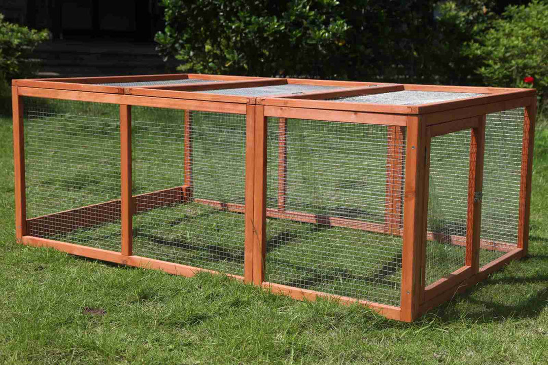 Large chicken coop rabbit hutch run made of solid fir wood, perfect for rabbits and guinea pigs in a garden setting.