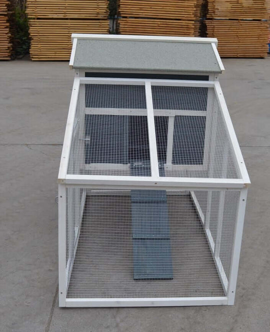 Large chicken coop with wire mesh and removable perch, perfect for rabbits, guinea pigs, and chickens.