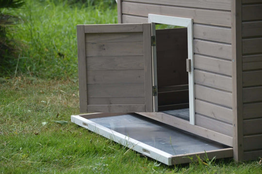 YES4PETS XL Chicken Coop door with pull-out tray for easy cleaning in garden.